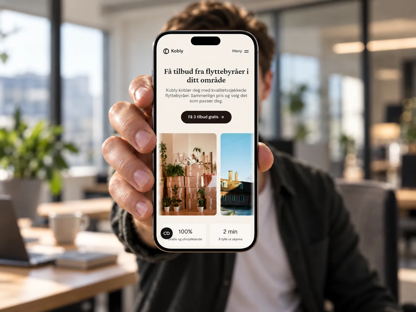 Nettsiden til Kobly vist på mobil i et kontor